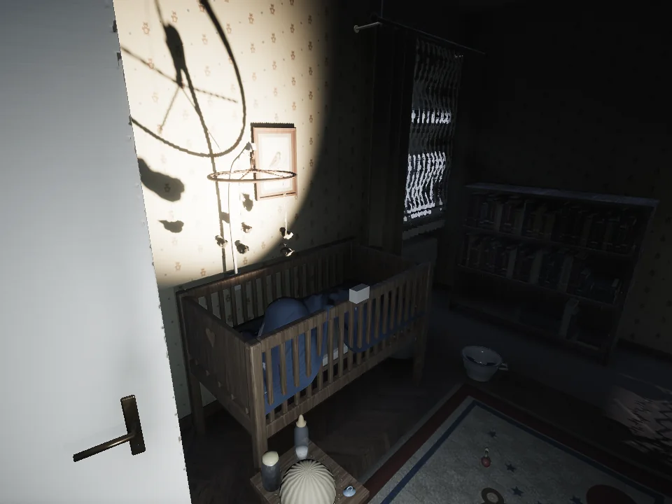 The nursery through a half-open door. A beam of light on the wallpaper casts the shadow of the mobile above the crib.