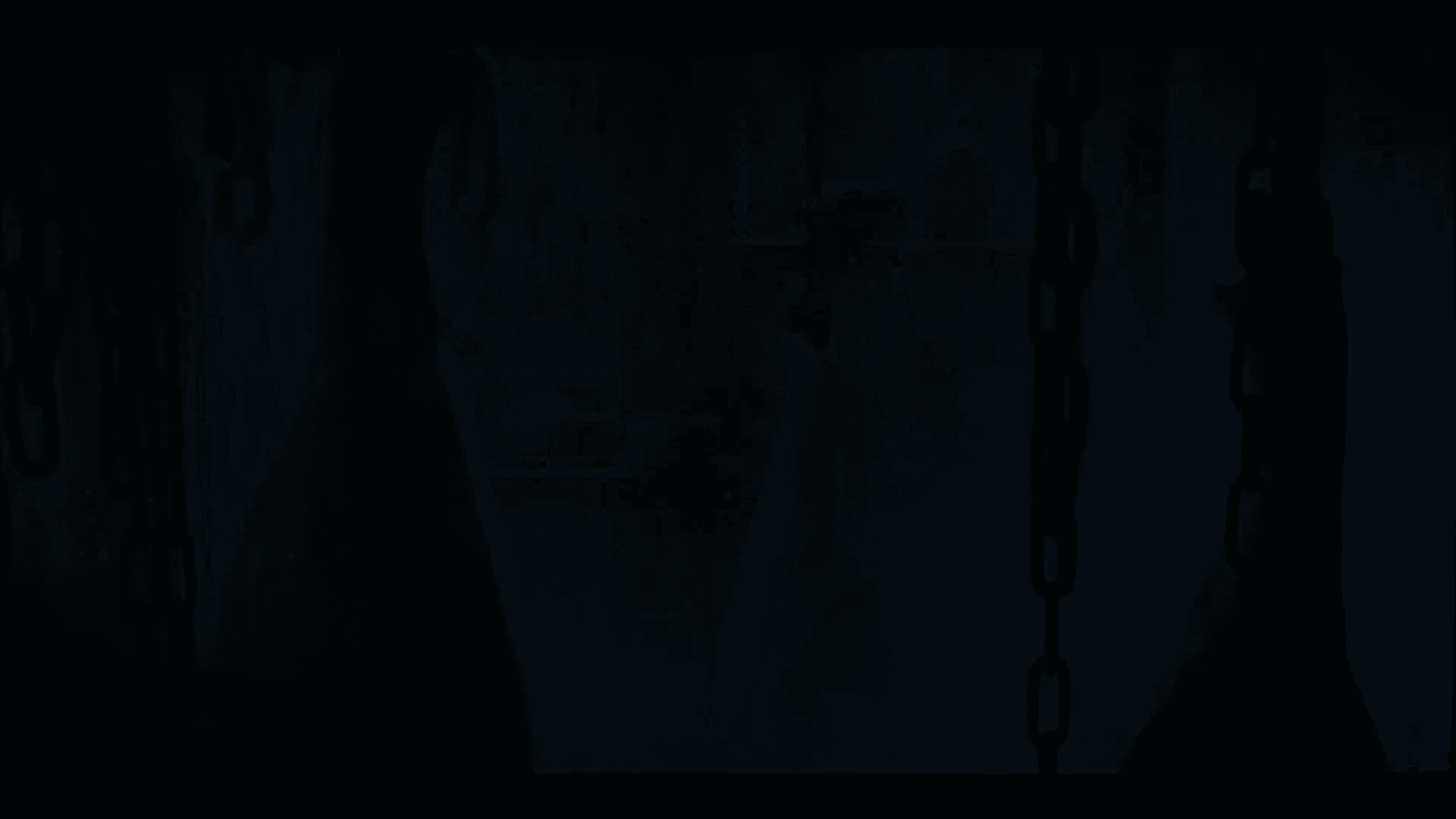 Dark basement with creature approaching