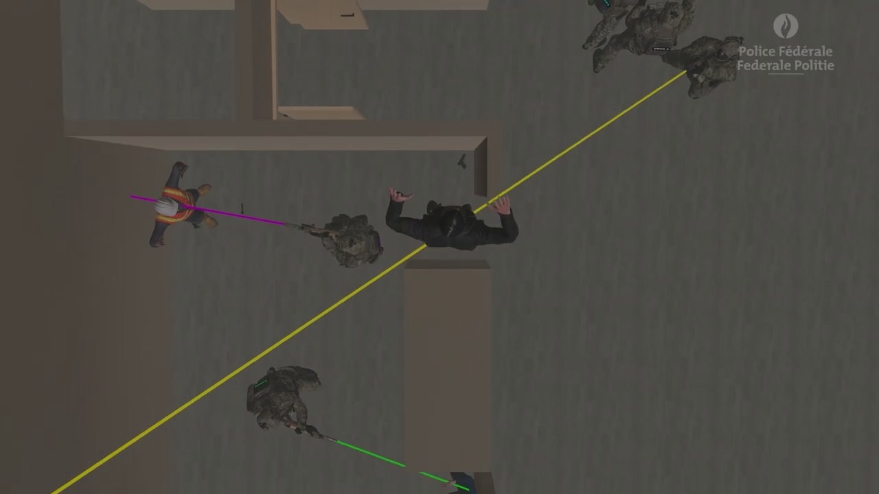A top-down view of the simulated building: figures standing in separate rooms on either side of a wall, with coloured aim lines crossing the floor